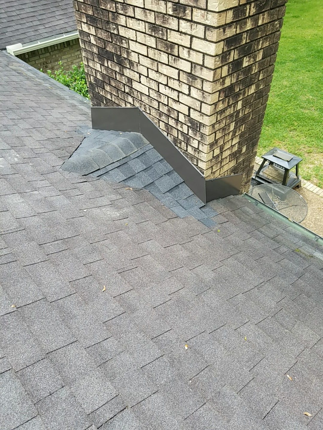 Completed step flashing beside chimney, Mobile AL